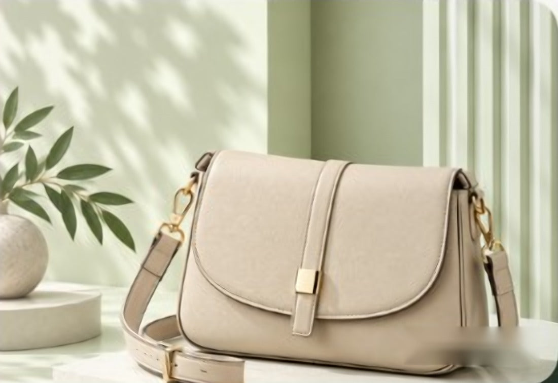 Beige crossbody bag with gold hardware